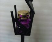 Кованые подсвечники на кладбище